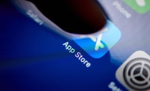 A finger taps on the Apple App Store app on a phone screen.