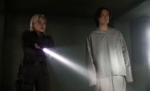 'Thunderbolts*' characters Yelena and Bob stand in a dark room.