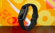 fitbit inspire 3 fitness tracker against a yellow patterned background