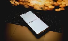 The Youporn logo is being displayed on a smartphone screen