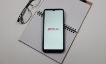 In this photo illustration a Redtube logo is displayed on a smartphone screen