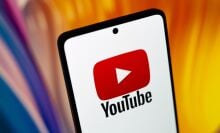 The YouTube logo on a phone.