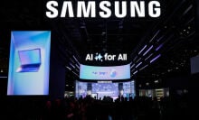 Samsung booth at a tech conference with a sign underneath saying "AI for all"