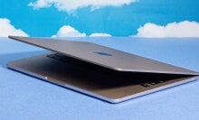 M2 MacBook Air against a cloud background