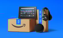 amazon boxes and devices on blue background