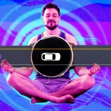 A man meditates behind a smartwatch with an image of a car on its screen.