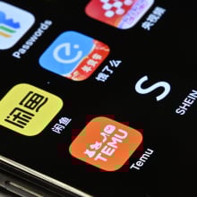 Temu and Shein e-commerce apps on a mobile phone