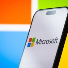 The logo of Microsoft Corporation is displayed on a smartphone screen, with the company's colorful branding visible in the background, on April 26, 2025, in Chongqing, China. Microsoft is a leading American multinational technology company, known for its Windows operating system, Microsoft Office software suite, Azure cloud services, and other enterprise and consumer technology products.
