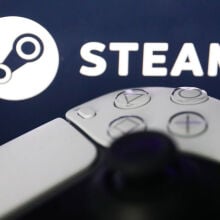 a gaming controller in front of the steam logo
