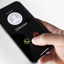 an unknown caller on a phone