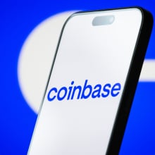 coinbase logo on a phone