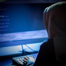 Hacker at computer
