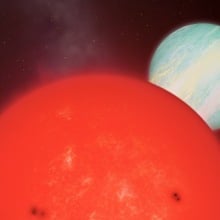 An artist's rendering of a gas giant orbiting a red dwarf star.