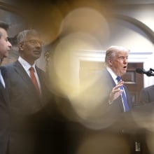 FDA Commissioner Martin Makary, National Institutes of Health Director Jay Bhattacharya, President Donald Trump and Health and Human Services Secretary Robert F. Kennedy Jr. stand at a podium.