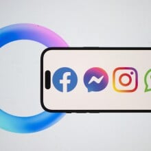 A phone showing the logos of Meta's products, including Facebook, Instagram, WhatsApp, and Messenger.