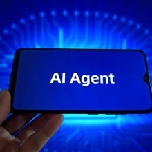 In this photo illustration, the logo of AI Agent is displayed on a smartphone screen