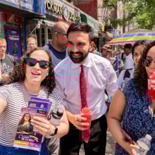 Zohran Mamdani, New York City mayoral candidate, center, greets supporters during a campaign event in New York.