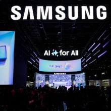 Samsung booth at a tech conference with a sign underneath saying "AI for all"