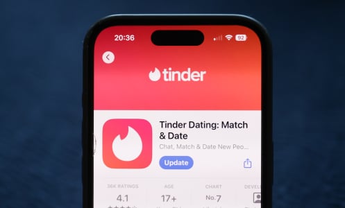 Tinder on App Store displayed on a phone screen