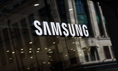 Samsung logo on glass window at night