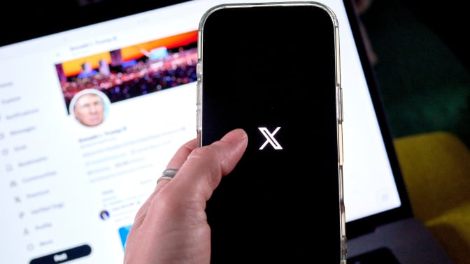 X logo on smartphone