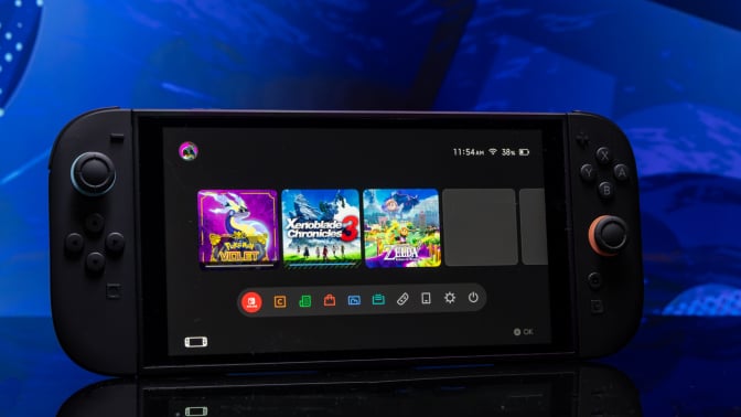 A Nintendo Switch 2 viewed from the front in front of a blue background