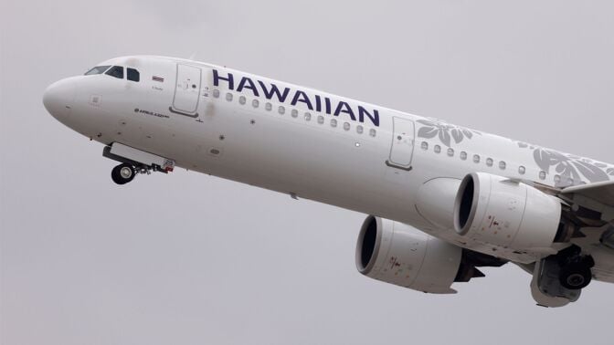 A Hawaiian Airlines plane taking off.