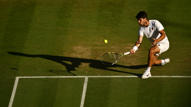 Carlos Alcaraz of Spain plays a forehand