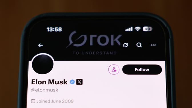 A phone screen showing Elon Musk's X profile. 