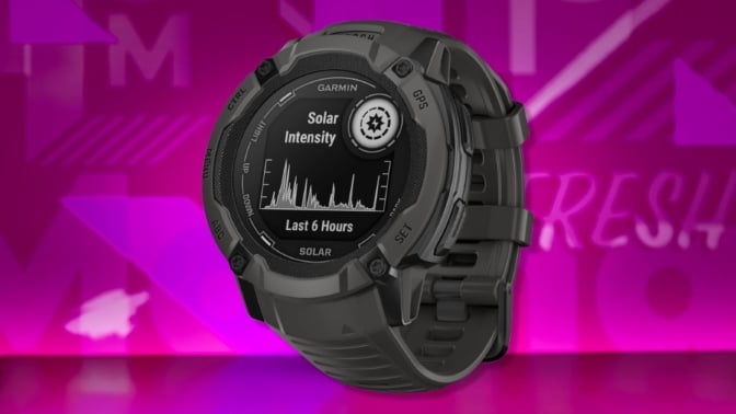 The Garmin Instinct 2X Solar Smartwatch on a purple background