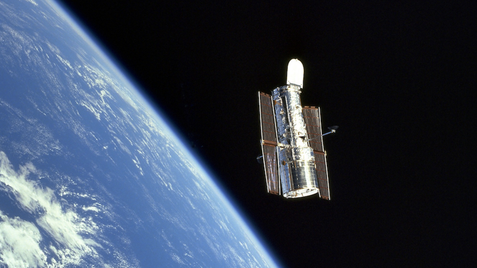 The Hubble Space Telescope as seen from the Space Shuttle Discovery in December 1999.