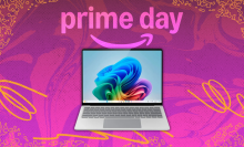 a 13.8-inch microsoft surface laptop 7 against a pink background beneath a prime day logo