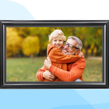 A black Canupdog digital photo frame is displayed against a white and blue background.