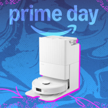 White Roborock Qrevo S robot vacuum arranged on swirly blue and purple Prime Day themed backdrop