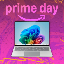 a 13.8-inch microsoft surface laptop 7 against a pink background beneath a prime day logo