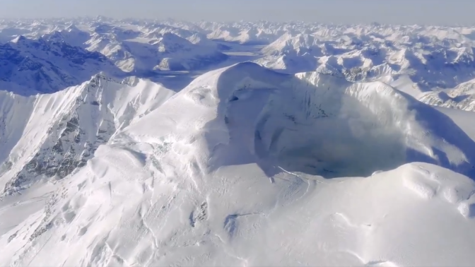 A view captured from a plane passing over the summit crater of Alaska's Mount Spurr in early February 2025.