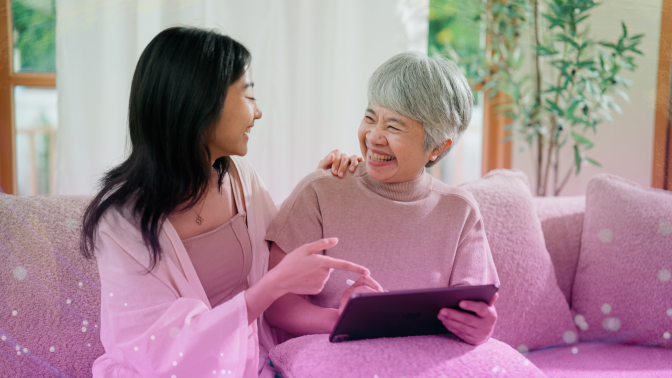 Mother and daughter using tablet