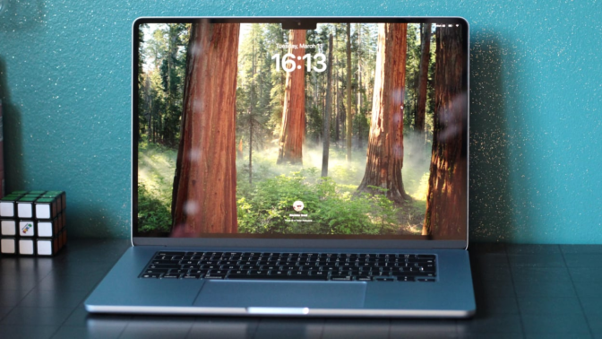 the 15-inch m4 apple macbook air on a desk against a blue speckled wall