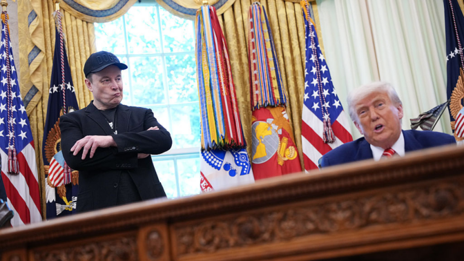 Tesla CEO Elon Musk listens as U.S. President Donald Trump speaks to reporters in the Oval Office of the White House on May 30, 2025 in Washington, DC.