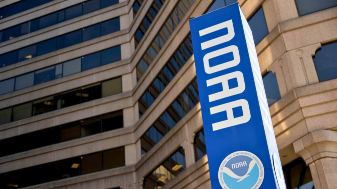 Signage outside the National Oceanic and Atmospheric Administration (NOAA) headquarters in Silver Spring, Maryland, US.