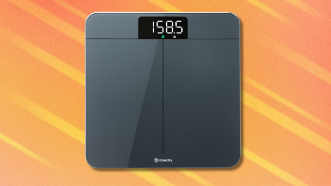 Etekcity Scale on orange abstract background
